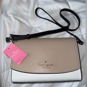 Convertible crossbody (never used) Including complimentary wallet (barely used)